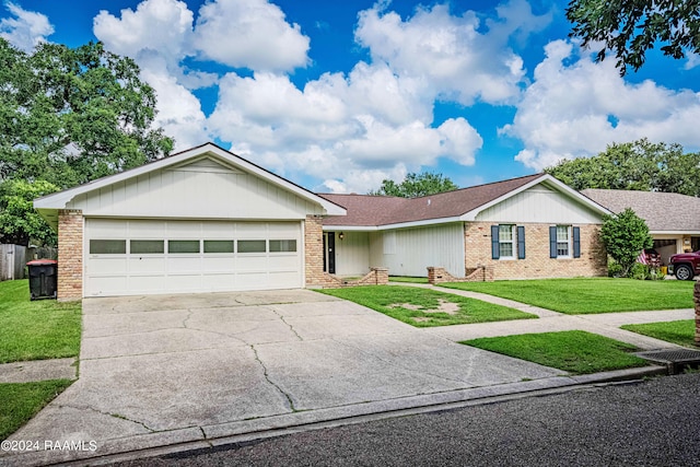 ranch-style home with a garage and a front yard