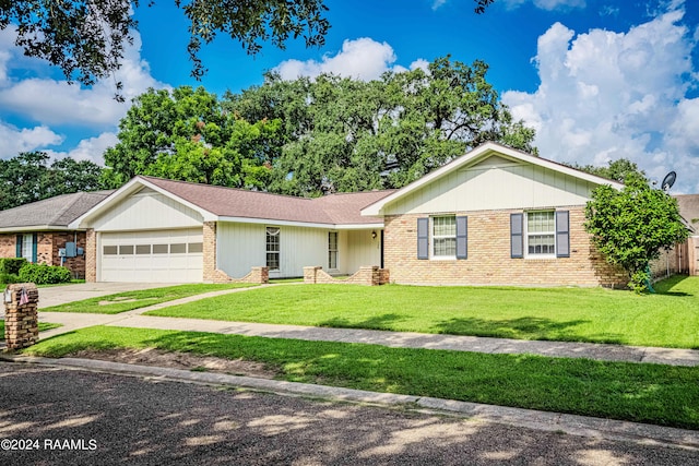 ranch-style house with a garage and a front lawn