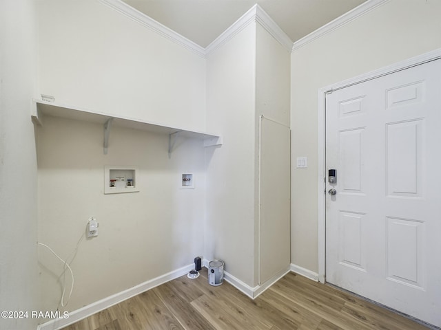 clothes washing area with laundry area, hookup for a washing machine, wood finished floors, and baseboards
