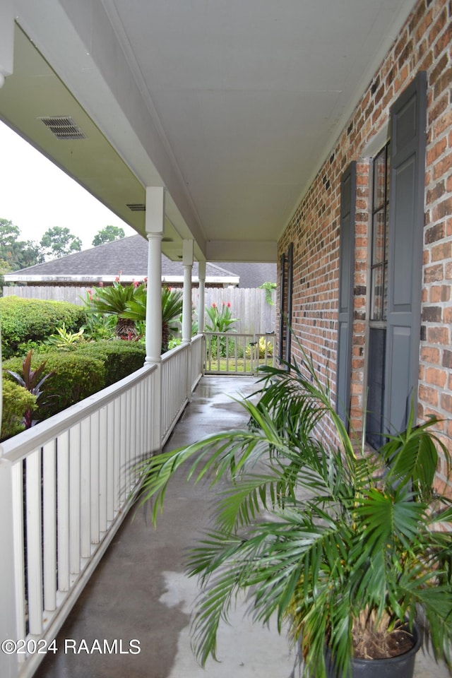 view of patio featuring a porch