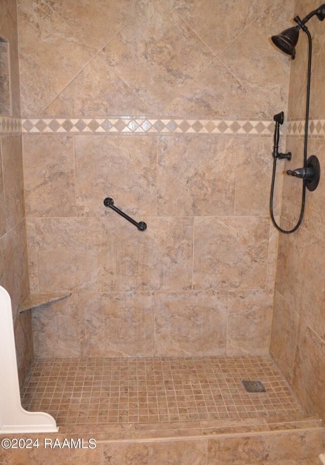 interior space with a tile shower