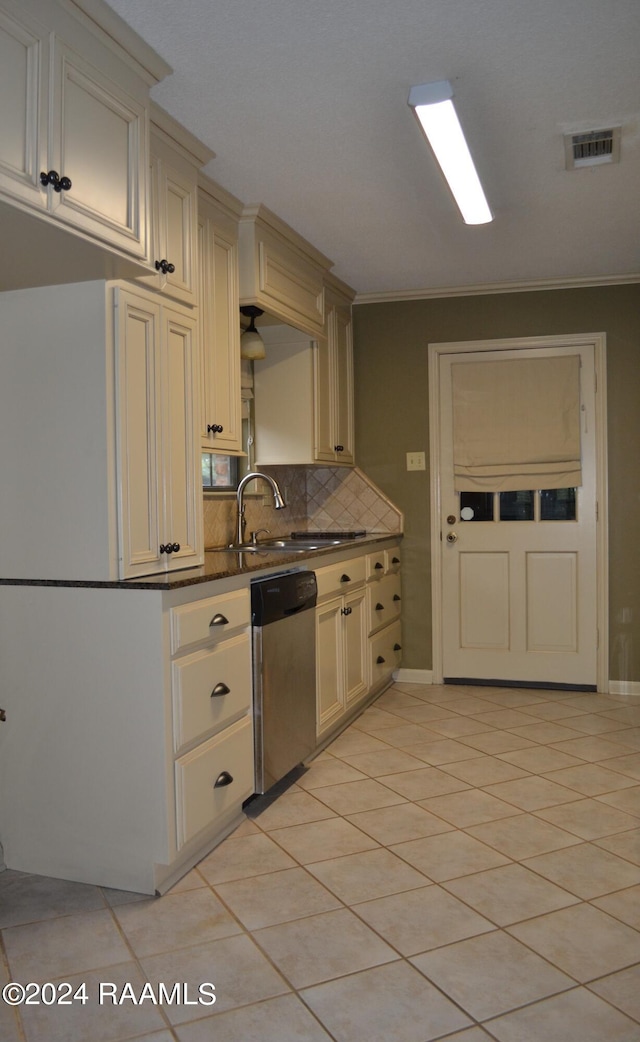 kitchen with cream cabinets, dishwasher, crown molding, and sink