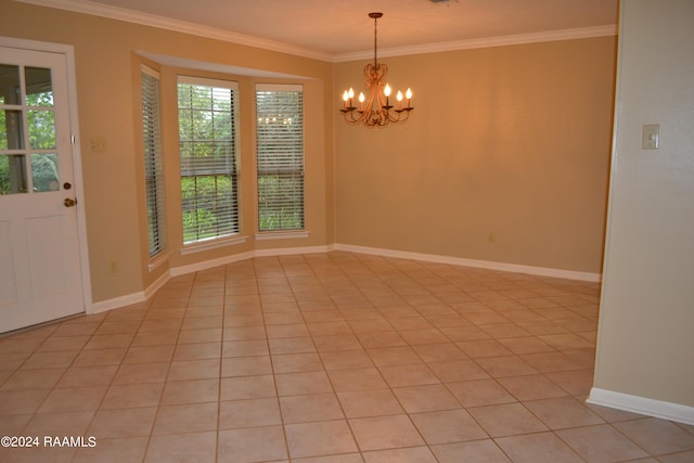 unfurnished room featuring ornamental molding, an inviting chandelier, and light tile patterned flooring