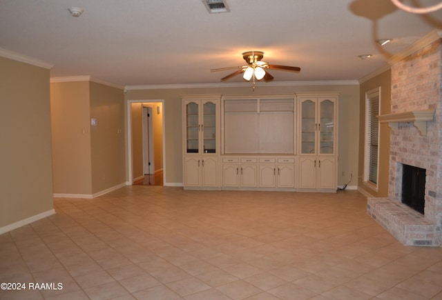 unfurnished living room with ceiling fan, a fireplace, and ornamental molding