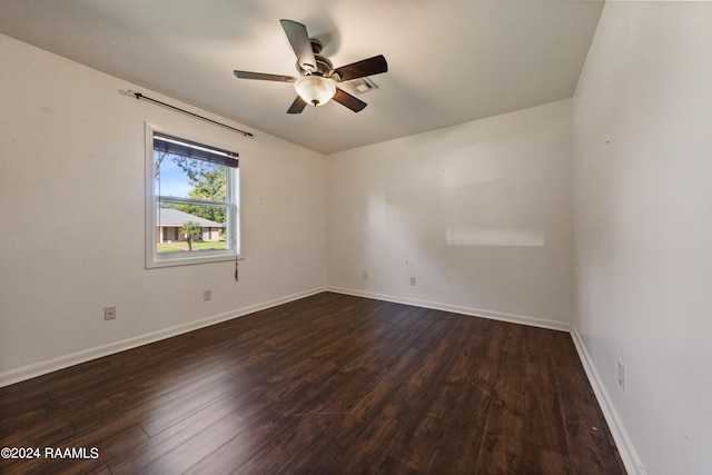 empty room featuring hardwood / wood-style floors and ceiling fan