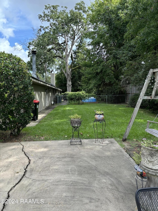 view of patio featuring a pool