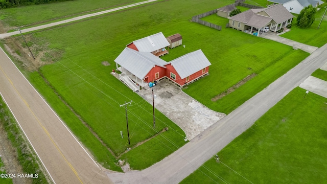 birds eye view of property featuring a rural view