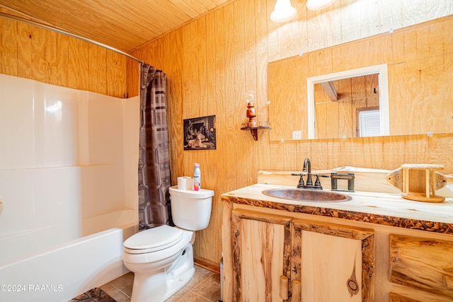 full bathroom with tile patterned floors, wooden ceiling, shower / bath combo, toilet, and vanity