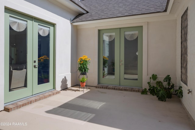 doorway to property featuring french doors and a patio area