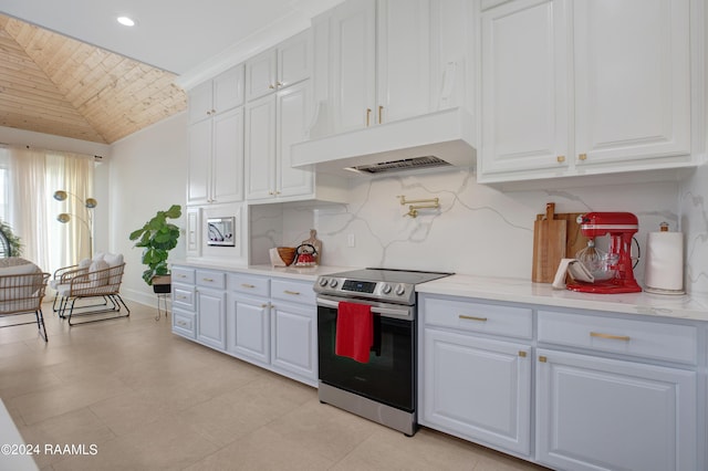 kitchen with lofted ceiling, premium range hood, electric range, tasteful backsplash, and white cabinets