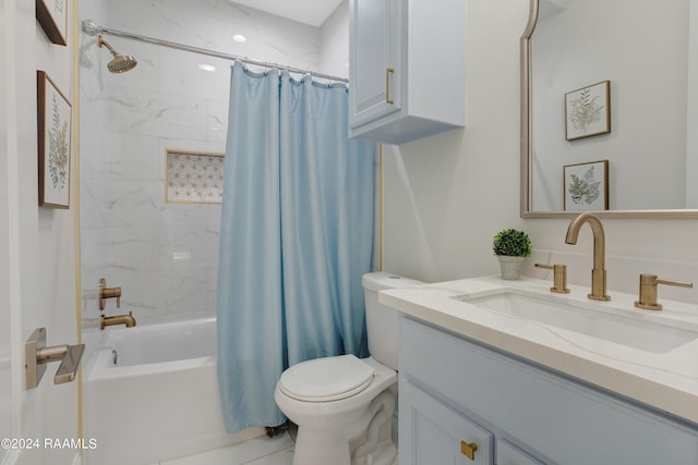 full bathroom featuring vanity, shower / tub combo with curtain, and toilet