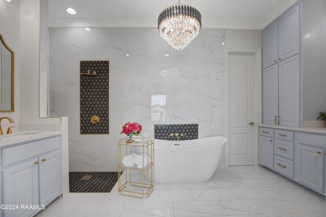 bathroom featuring an inviting chandelier, ornamental molding, separate shower and tub, and vanity