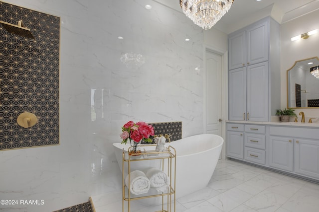 bathroom featuring vanity, separate shower and tub, tile walls, and an inviting chandelier