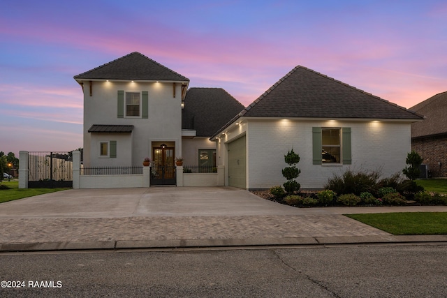 view of front of property with a garage