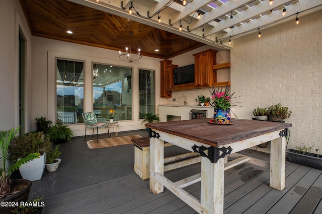 deck featuring wine cooler and sink