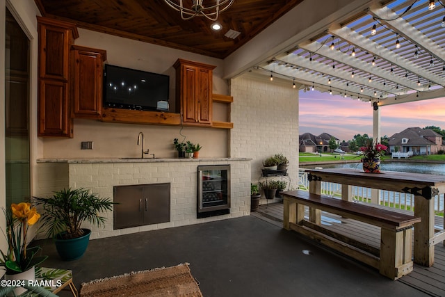 exterior space featuring sink and a pergola