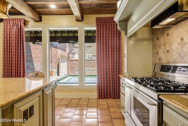 kitchen featuring light tile patterned flooring, double oven range, beam ceiling, wall chimney exhaust hood, and wood ceiling