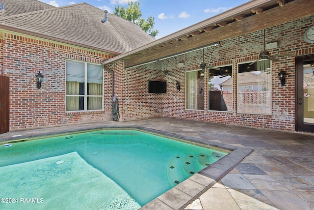 view of swimming pool featuring a patio area