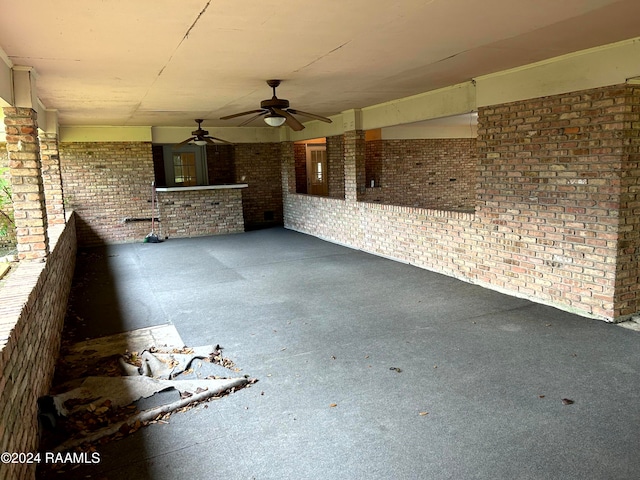 view of patio featuring ceiling fan