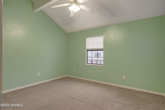 unfurnished room with carpet, ceiling fan, and lofted ceiling with beams