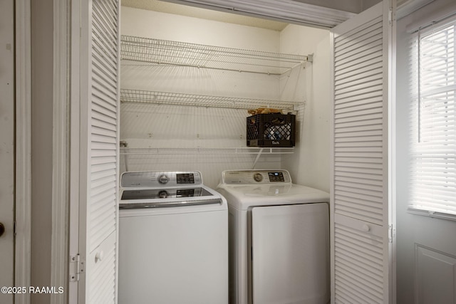 laundry room with washer and dryer