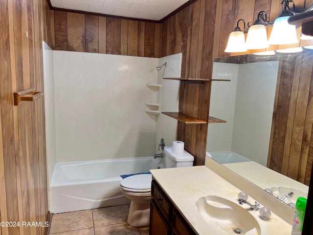 full bathroom featuring vanity, tile patterned floors, washtub / shower combination, wooden walls, and toilet