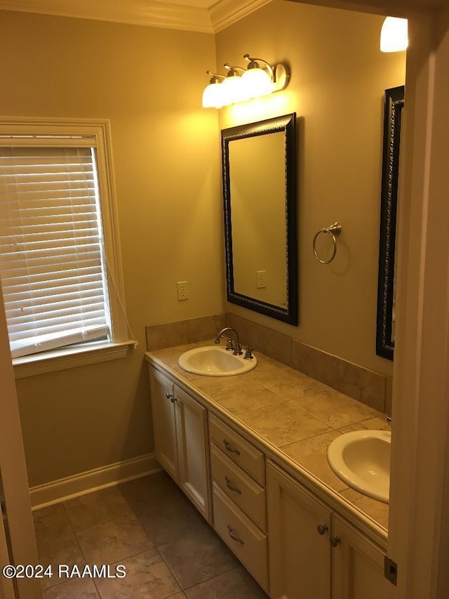 bathroom featuring tile patterned floors, vanity, and ornamental molding