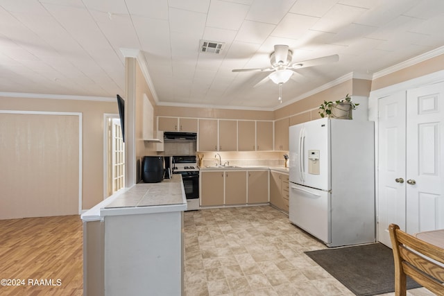 kitchen featuring white appliances, crown molding, light wood-type flooring, exhaust hood, and ceiling fan