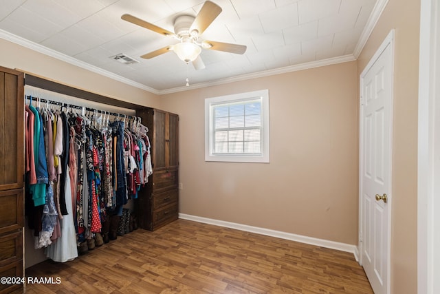 spacious closet with wood-type flooring and ceiling fan