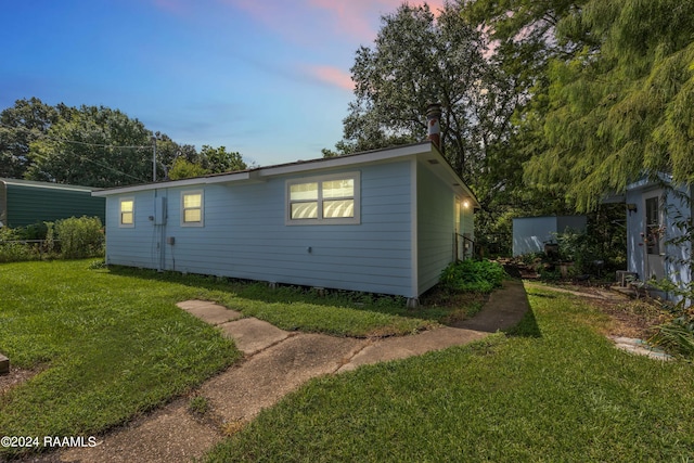 exterior space featuring a lawn