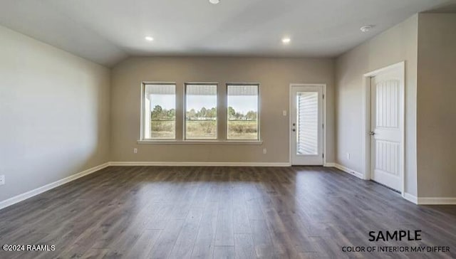 interior space featuring baseboards, dark wood-type flooring, and recessed lighting