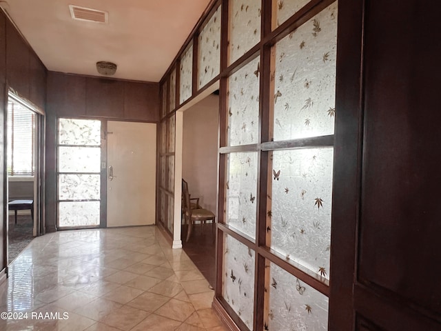 interior space with light tile patterned floors