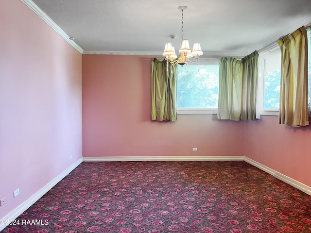 carpeted empty room with crown molding and an inviting chandelier