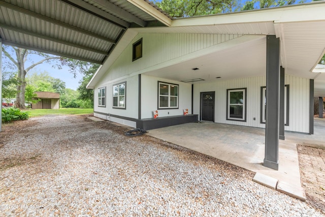 entrance to property with a patio