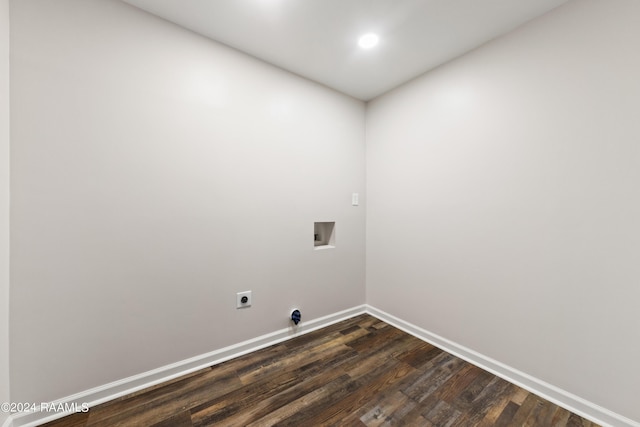 washroom featuring hookup for an electric dryer, washer hookup, and dark hardwood / wood-style flooring