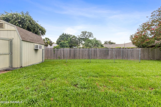 view of yard featuring a storage unit