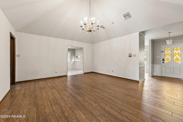 unfurnished living room featuring a notable chandelier, wood-type flooring, and high vaulted ceiling