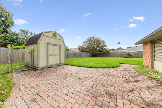 view of patio with a shed