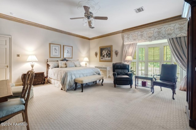 bedroom with crown molding, carpet floors, and ceiling fan