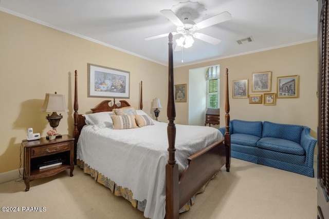 bedroom featuring crown molding, ceiling fan, and light colored carpet