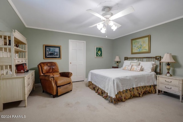 bedroom with ceiling fan, ornamental molding, and light colored carpet