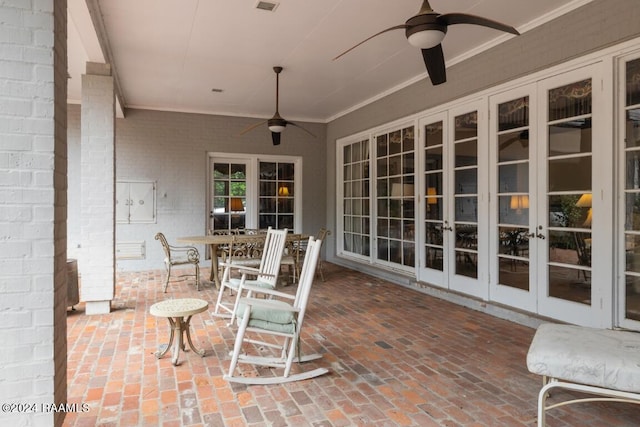 view of patio featuring french doors and ceiling fan