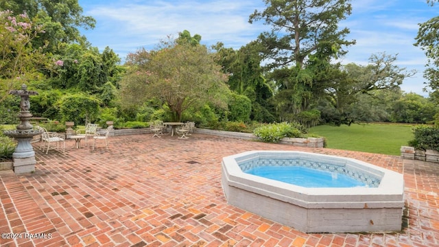 view of swimming pool featuring a patio area