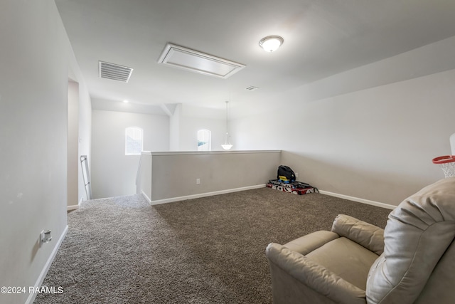 sitting room with carpet flooring