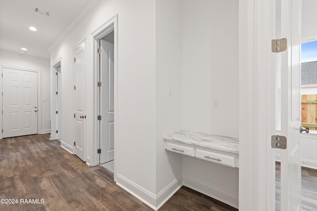 corridor with dark hardwood / wood-style flooring