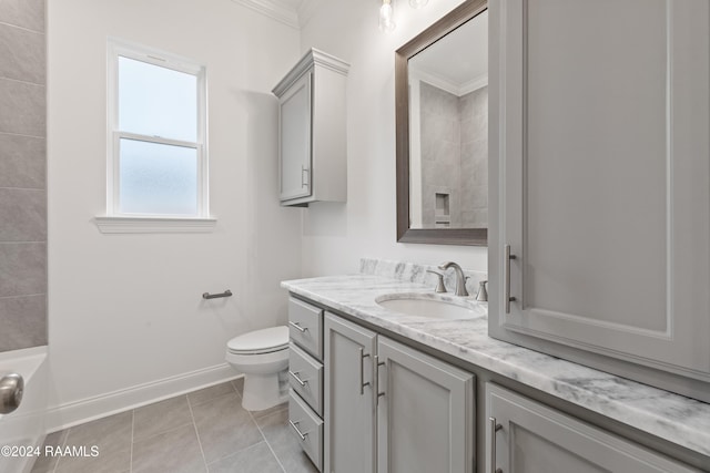 bathroom featuring vanity, tile patterned floors, ornamental molding, and toilet