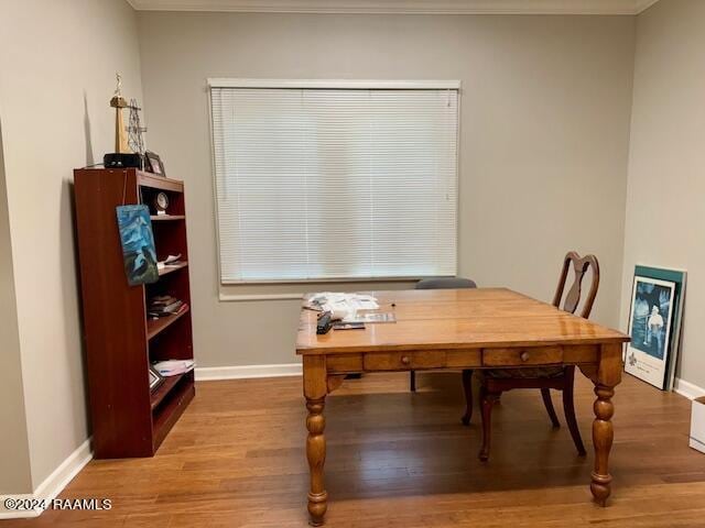 office space featuring hardwood / wood-style flooring and ornamental molding