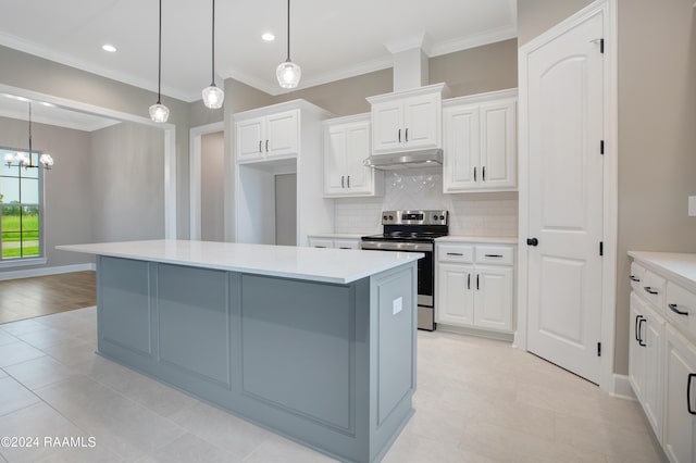 kitchen with under cabinet range hood, a kitchen island, stainless steel electric stove, tasteful backsplash, and white cabinetry