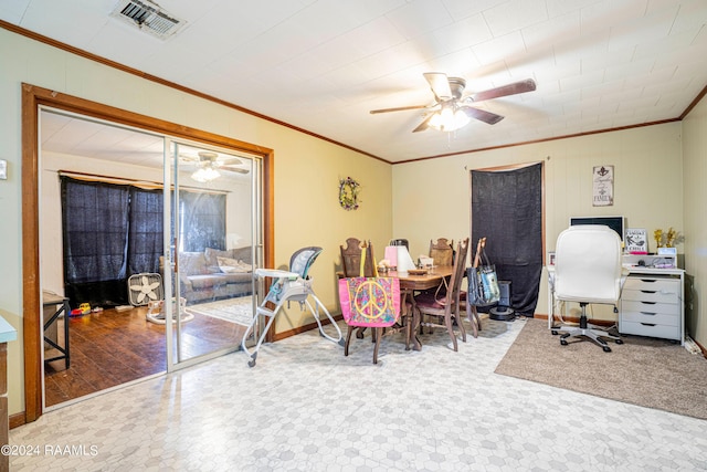 dining space featuring ceiling fan, crown molding, and tile patterned flooring