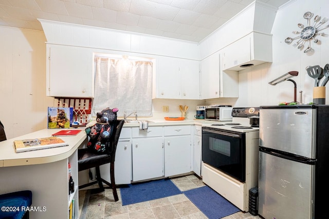 kitchen featuring light tile patterned flooring, white electric range oven, stainless steel refrigerator, white cabinetry, and crown molding